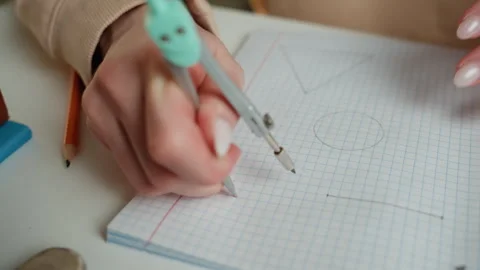 Hands drawing circle. Math instructor illustrating detailed geometric Stock Footage 336867000