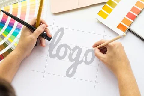 Hands drawing a logo Stock Illustration