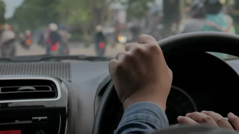Hands of driver on steering wheel, driving a car concept, car trip journey pr Stock Footage 140412736