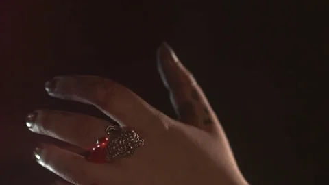 Hands dropping blood red paint Stock Footage 81044316