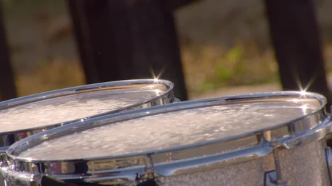 Hands of drummer playing in slow motion at football game Stock Footage 102105939
