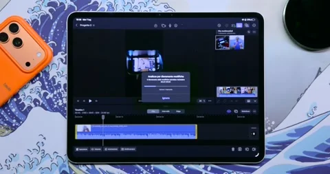 Hands editing vertical video on iPad Pro using Final Cut Pro Stock Footage 341327181