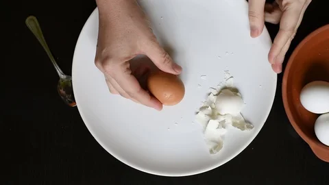 Hands off the egg-shell of chicken eggs at home Stock Footage 96065016