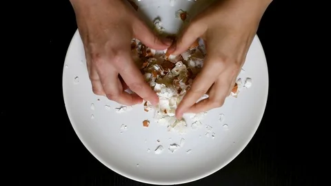 Hands off the egg-shell of chicken eggs at home Stock Footage 96188264