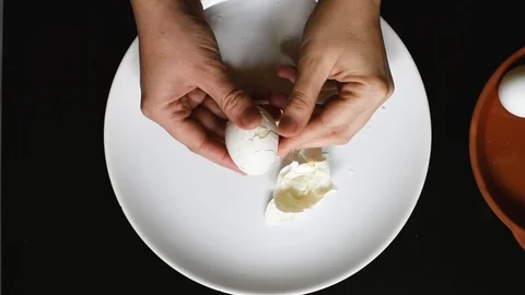 Hands off the egg-shell of chicken eggs at home Stock Footage 96188270