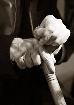 Hands of the elderly man Stock Photos