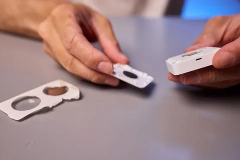 Hands Engaging with Technology Interactive Device Assembly and the Art of Stock Photos