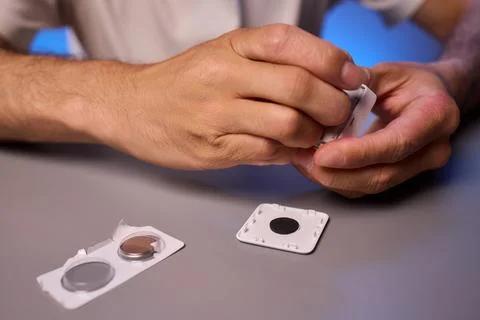 Hands Engaging with Technology Interactive Device Assembly and the Art of Stock Photos