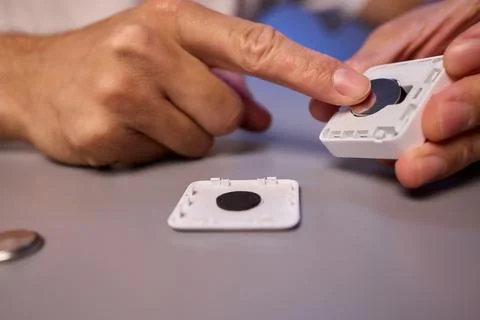 Hands Engaging with Technology Interactive Device Assembly and the Art of Stock Photos