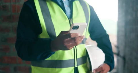 Hands, engineer and person with phone at construction site, text message and Vídeos de archivo 337150642