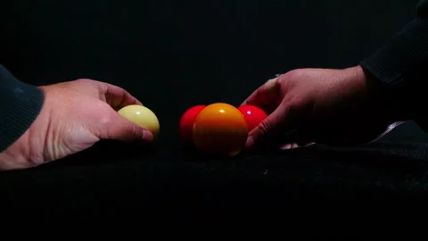 Hands entering frame and moving billiard balls Stock Footage 247300776