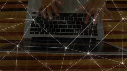 Hands entering frame, settling on laptop keys, typing rapidly to work while Stock Footage 335732055
