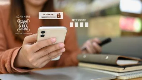Hands entering verification code on smartphone for login to web page 스톡 사진