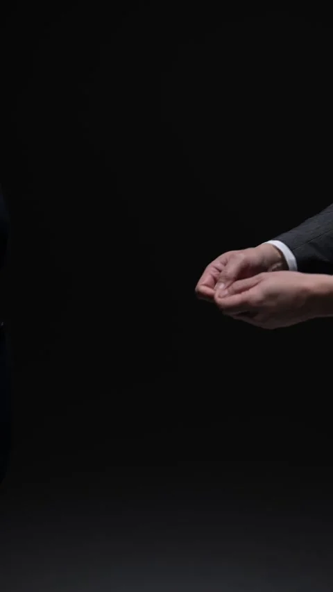 Hands exchanging a bundle of cash Stock Footage 336766054