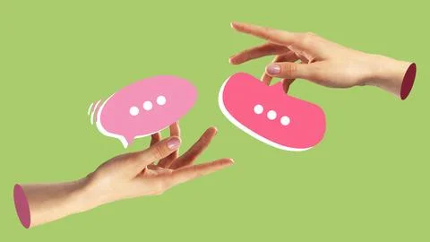 Hands exchanging message bubbles in a digital conversation on a green background Stock Photos