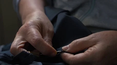 The hands of expert female tailor Stock Footage 76126271