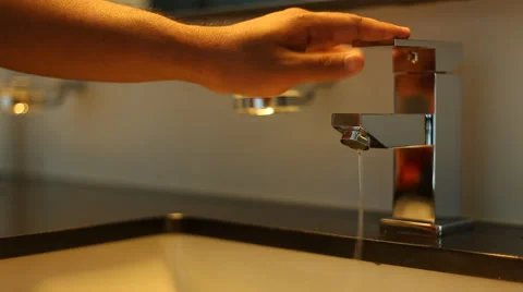 Hands off the faucet Stock Footage 63373899