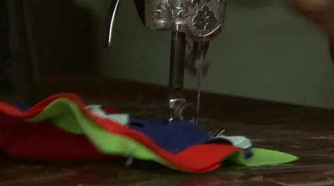 Hands Feeding Cloth on Sewing Machine Stock Footage 11495239