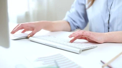 Hands of female call center operator on keyboard.  Stock Footage 108534791