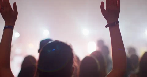 Hands of Female Christian Worshiping and Praising God on Christian Concert Stock Footage