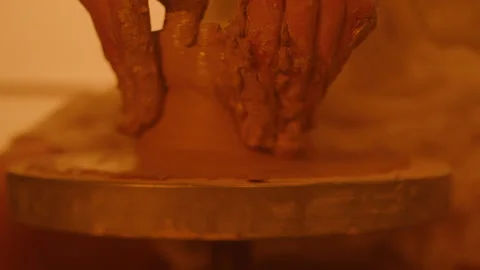 Hands of a female potter Stock Footage 235560553