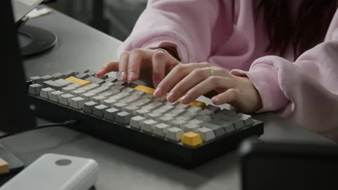 Hands of Female Programmer Typing Code on Computer Keyboard Stock-Footage 335936347