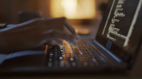Hands of Female Programmer Writing Computer Code on Laptop at Night Stock Footage 123276251