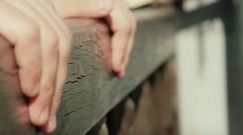 Hands on the fence Stock Footage 8533046