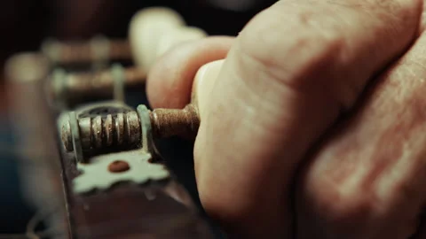 Hands Finding The Perfect Tune Of The Guitar Stock Footage 291194353
