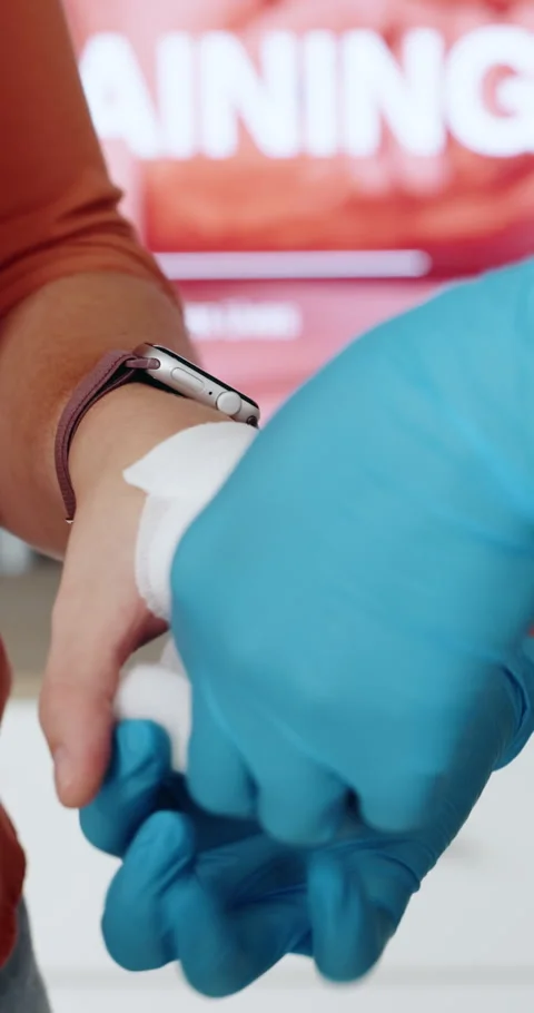 Hands, first aid and training with bandage at office, teaching and staff Stock Footage 332969185