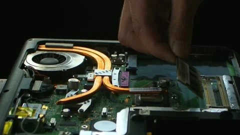 Hands fixing motherboard of pc or laptop notebook close up in service Stock Footage 233520185