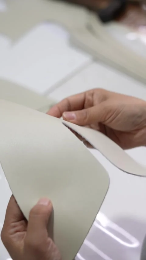 Hands Flex and Inspect Material Panel in Factory Vertical Video 스톡 동영상 340182787