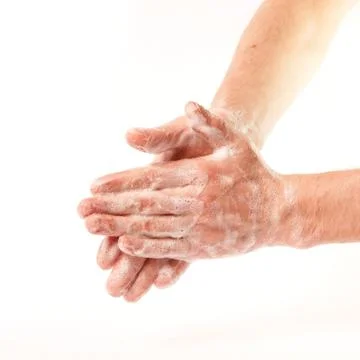 Hands in the foam Stock Photos