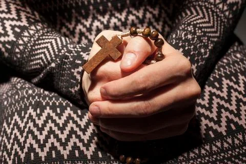 Hands folded to pray Stock Photos