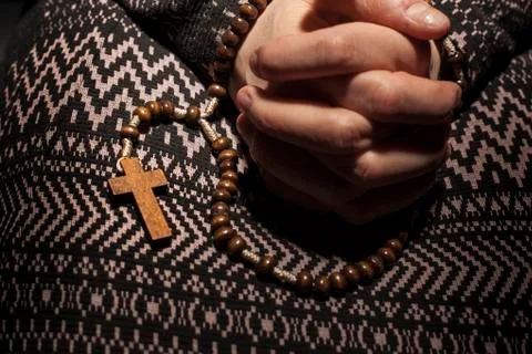 Hands folded to pray Stock Photos