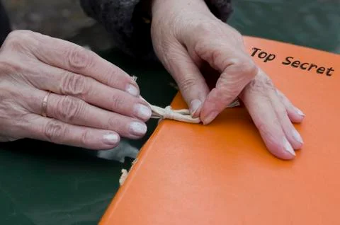 Hands On Folder Photos