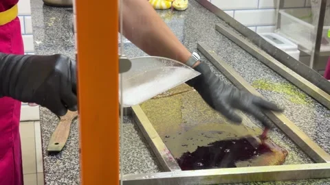 Hands Folding Golden Candy Slab On Granite 스톡 동영상 342515283