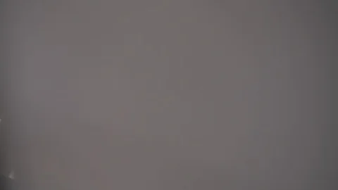 Hands folding a rectangle piece of dough into three parts, unfolding it Stock Footage 102164709