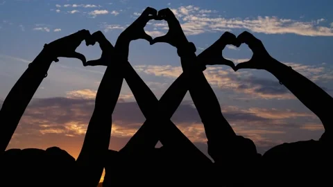 Hands in the form of Heart against the Sky pass sun beams, Time Lapse at Sunr Stock Footage 132630708