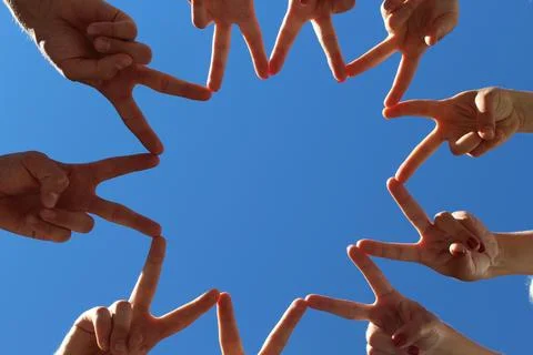 Hands form a star Stock Photos