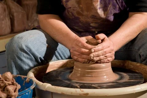 Hands forming clay Stock Photos