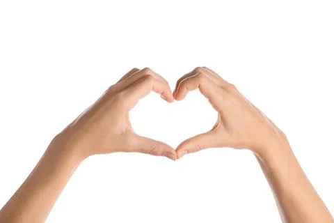 Hands forming a heart shape on white background Stock Photos