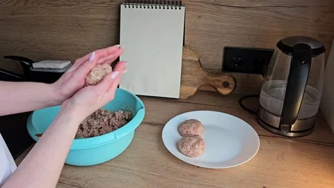 Hands Forming Meatballs in Kitchen Preparation Scene Stock Footage 305750798