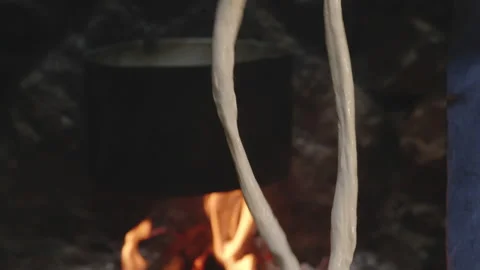 Hands Forming Tenili Cheese Into String,Chobareti, Georgia, Tilt Down Stock Footage 231872287