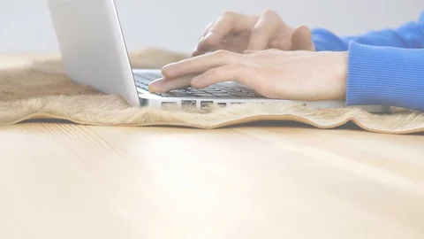 Hands of a freelance programmer are working on a laptop Stock Footage 100362136