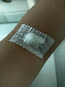Hands on gauze plester. Stock Photos