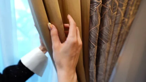 Hands Gently Tracing Soft, Flowing Velvet Drapes Video stock 307831511