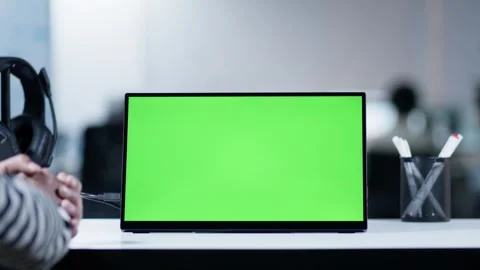 Hands Gesturing on Green Screen Computer Screen in Office During Online Proj Video stock 294884558