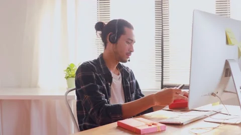 Hands with gift box and digital computer remote online concept Stock Footage 146026641