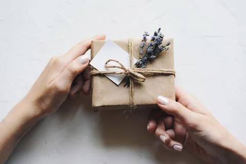Hands gift box Stock Photos